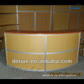 curved wooden reception table